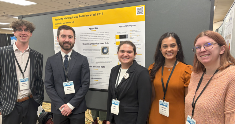 IPOL students presenting our research poster at the MPSA conference