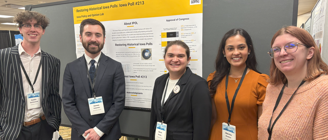 IPOL students presenting our research poster at the MPSA conference