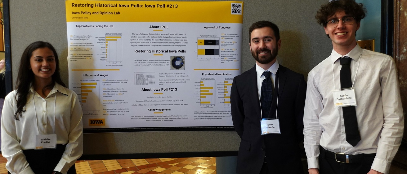 IPOL Students presenting their poster at Research in the Capital 2025