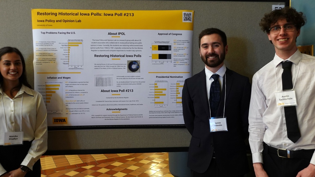 IPOL Students presenting their poster at Research in the Capital 2025